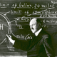 Robert Goddard at a blackboard at Clark University in Worcester, Massachusetts, in 1924 (NASA)